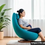 임신 중 요통 예방과 완화 방법 - A pregnant Thai woman sitting comfortably on a modern ergonomic chair with full back support and lum...